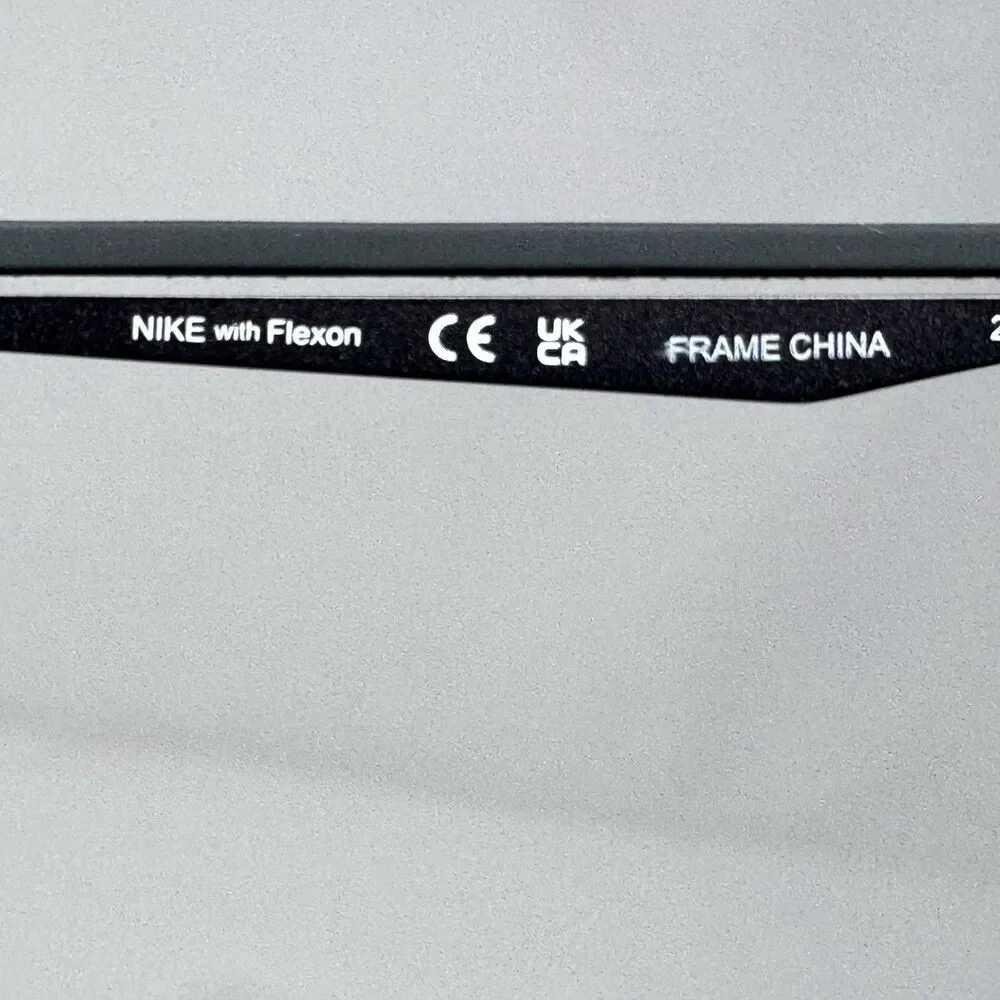 Nike 4313 070 Black Silver Semi-Rimless Flexon Eyeglass Frames 52-17-145
